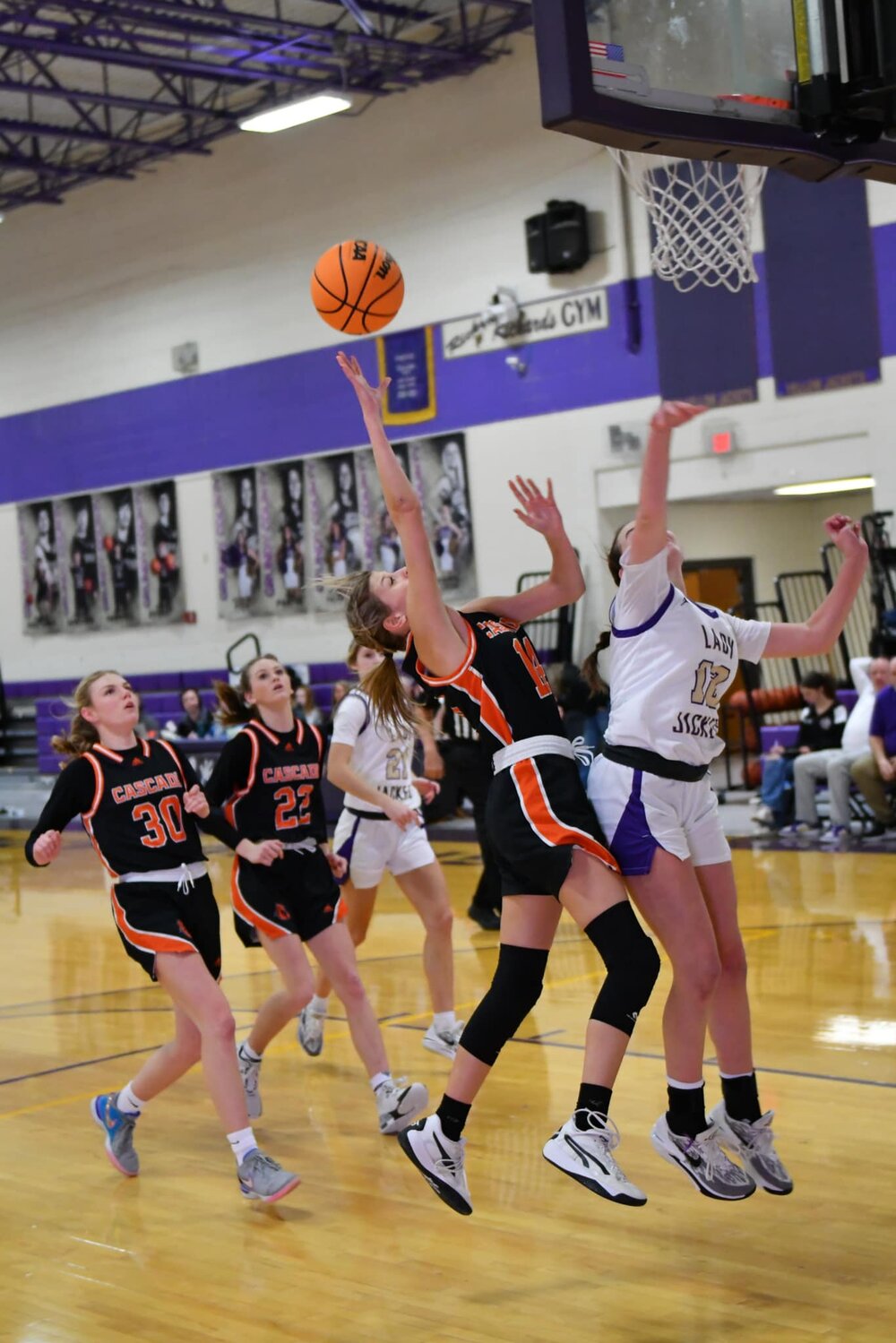 Kaydence Miller (14) goes up strong for two of her team-high 16 points at Grundy County. She finished with a double-double as she hauled in 10 rebounds as well.