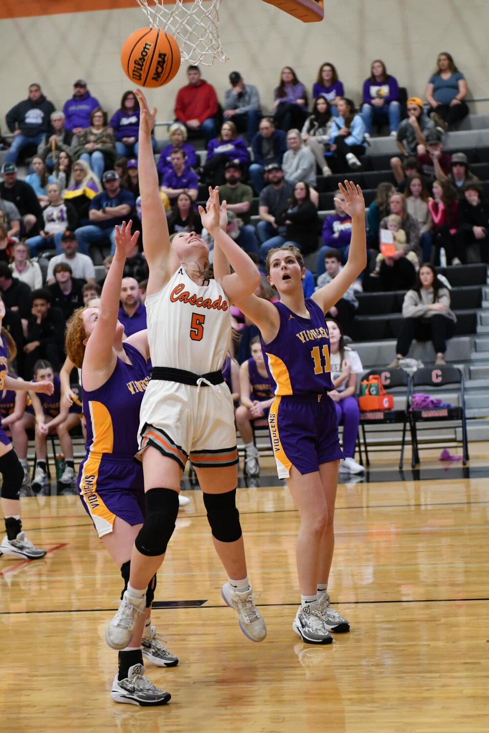 Sophie Ray (5) puts in two of her 13 points in Friday's win against Community.