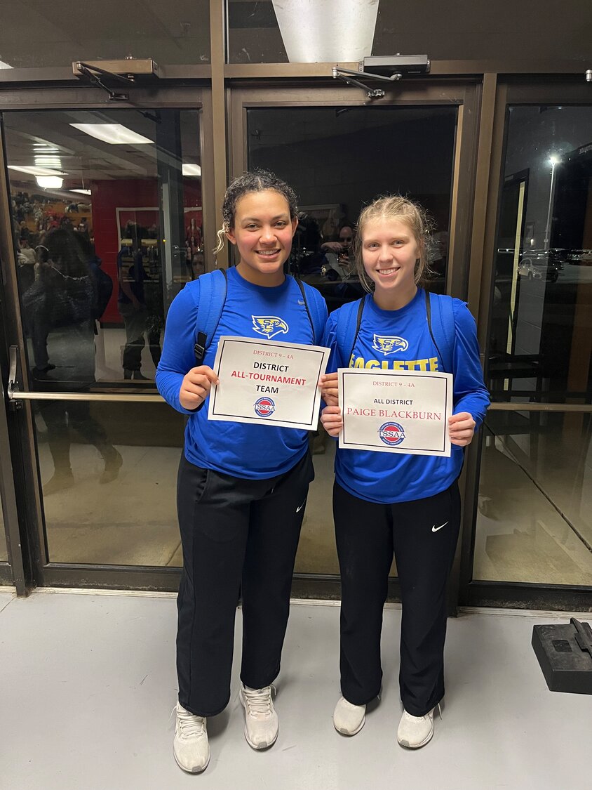 Lily Brown (left) and Paige Blackburn (right) pose with their All-District awards.