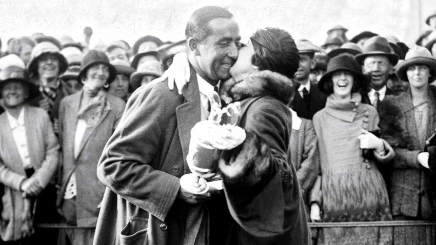 Walter Hagen getting a squeeze after winning the 1922 British Open. The first American-born golfer to raise the Claret Jug, Hagen and Bobby Jones would dominate the tournament for the rest of the decade.