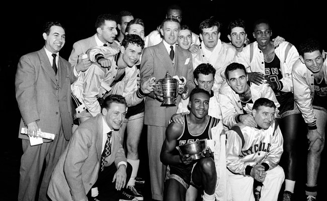 The City College of New York basketball team, winners of the 1950 NIT and NCAA tournament championships. Though, the explosion of a game-fixing scandal the following year would mar their legacy and the reputation of NY as the Mecca of college basketball.