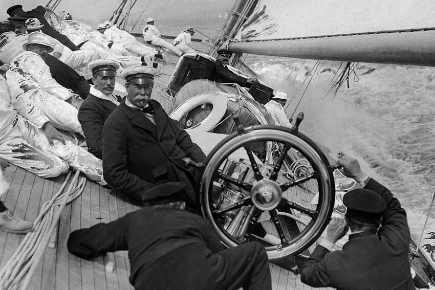 Thomas Lipton aboard one of his racing yachts. An avid sailor, the Irish-Scottish tea tycoon competed 5 times at the America's Cup and lost each challenge. The beloved yachtsman was later awarded with a special cup and declared 'greatest loser'.