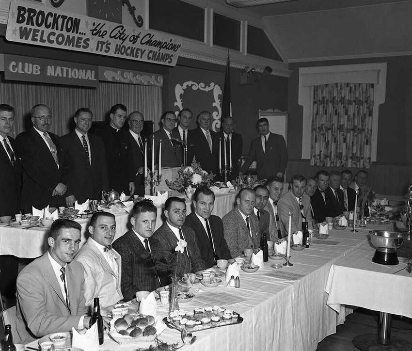 The Brockton Wetzell Hockey Club celebrates its U.S. national championship, April 13, 1959. (Stonehill College Archives and Historical Collections: Stanley A. Bauman Photographic Collection).