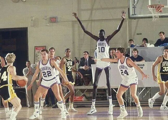 Sudan's 7&rsquo;7&rdquo; Manute Bol playing for the University of Bridgeport in 1984-85. The following year, he would be the tallest player and first African to be drafted into the NBA.