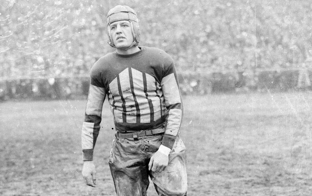 Harold "Red" Grange of the Chicago Bears shown in 1925.  George Halas, owner of the Bears and one of the founders of the NFL, referred to Red as "The Eternal Flame of Professional Football".