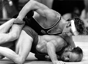 Dan Gable in action at the 1972 Olympics where he won gold in the lightweight freestyle wrestling competition.  Twice an NCAA Division I champion, Gable went on to a successful coaching career at the University of Iowa.  He remains the most accomplished freestyle wrestler in American history.