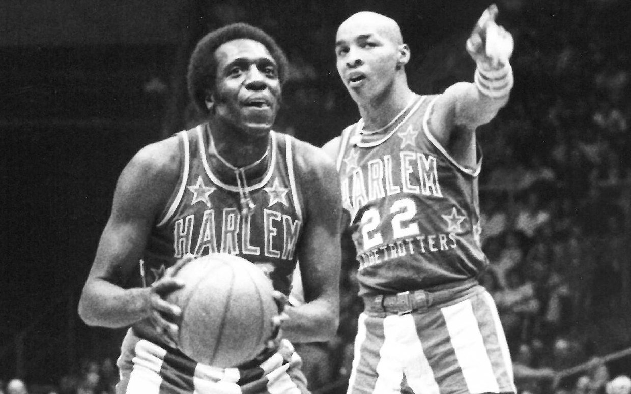 Curly Neal (right) who died on March 26, 2020, and Meadowlark Lemon (left) who died in 2015, performing one of their game antics as members of the Harlem Globetrotters.  They belonged to the last generation of Globetrotters who showcased basketball wizardry around the world before the NBA took off in the 1980s.