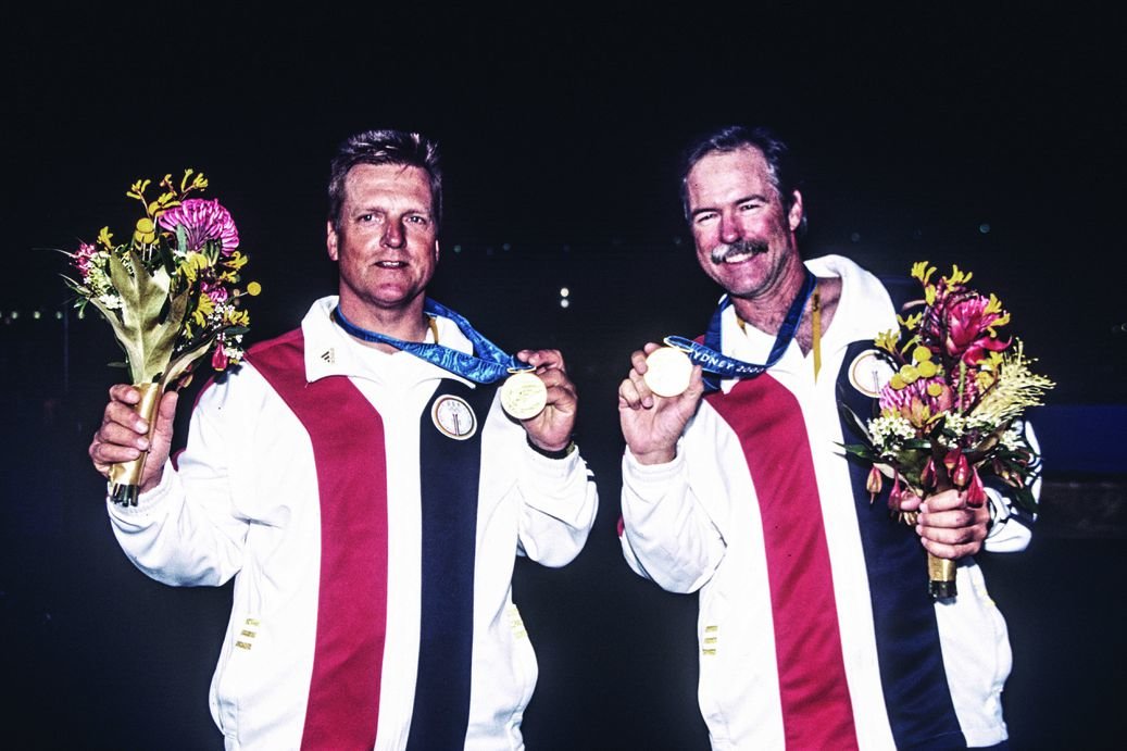 Mark Reynolds (right) and his partner Magnus Liljedahl displaying their gold medal after winning the Star class regatta at the 2000 Sydney Olympics.