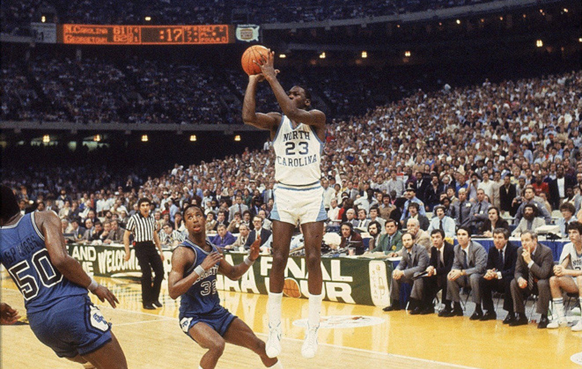 UNC's Michael Jordan takes the game-winning shot at the 1982 NCAA Final with 17 seconds remaining. A defining moment in his career, Jordan was transformed from "Mike" to "Michael".