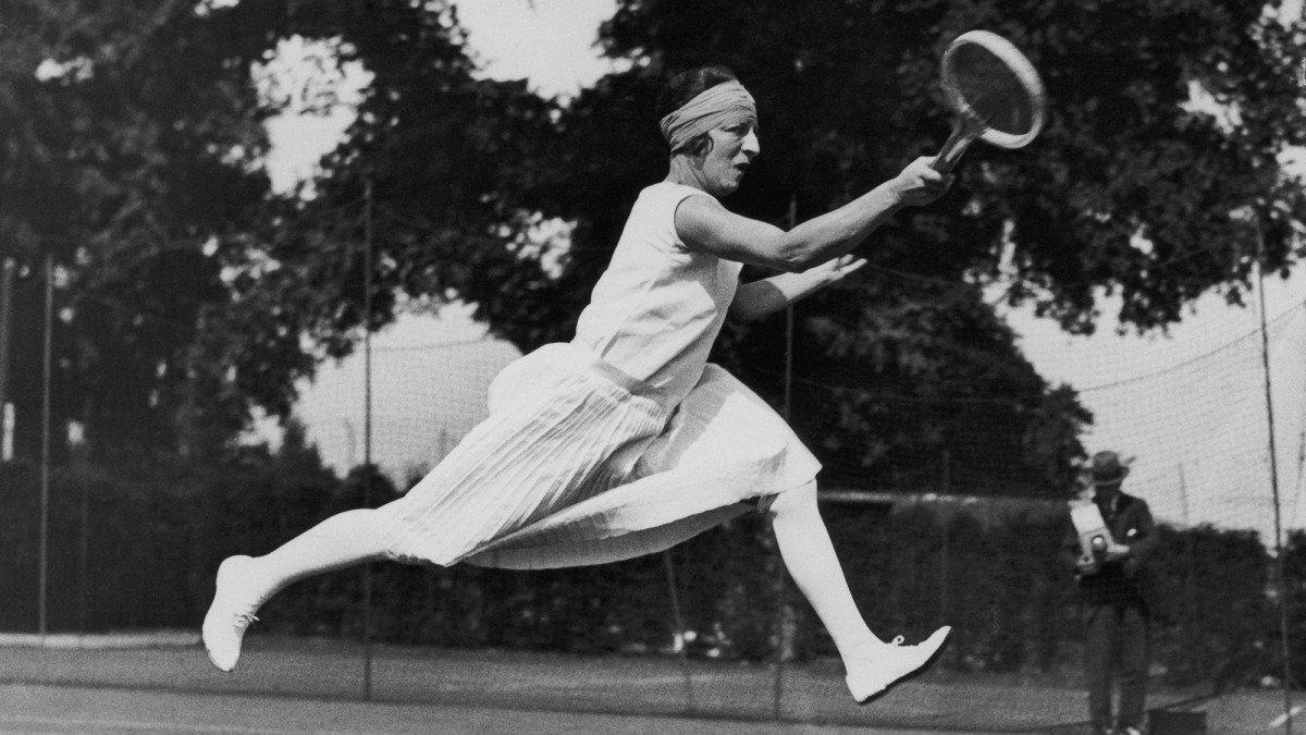 Frenchwoman Suzanne Lenglen in action on the tennis court. Her popularity drew large crowds at Wimbledon, prompting officials to relocate the tennis championships in 1922 to today's Centre Court.