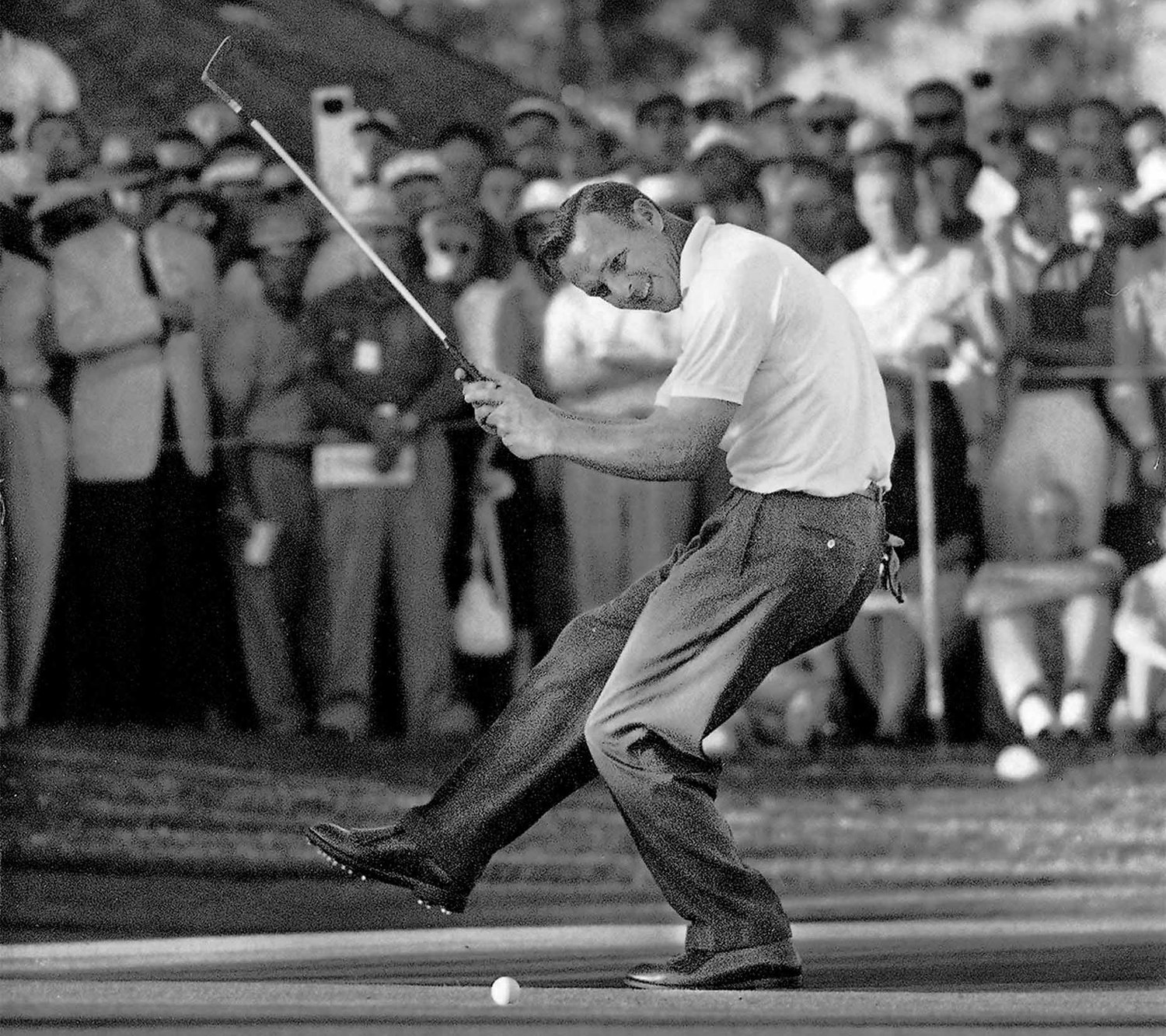 Arnold Palmer celebrating his victory at the 1960 U.S. Open where he delivered the greatest comeback in tournament history. Opening a new generational era in golf, the event also witnessed the arrival of Jack Nicklaus and the exit of Ben Hogan.