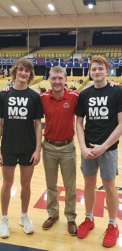 Junior Layne Colvin, Coach Michael Draper and sophomore Jay Baxter gather together at the SWMO underclassmen all-star game in Springfield on Saturday, March 27.&nbsp;
