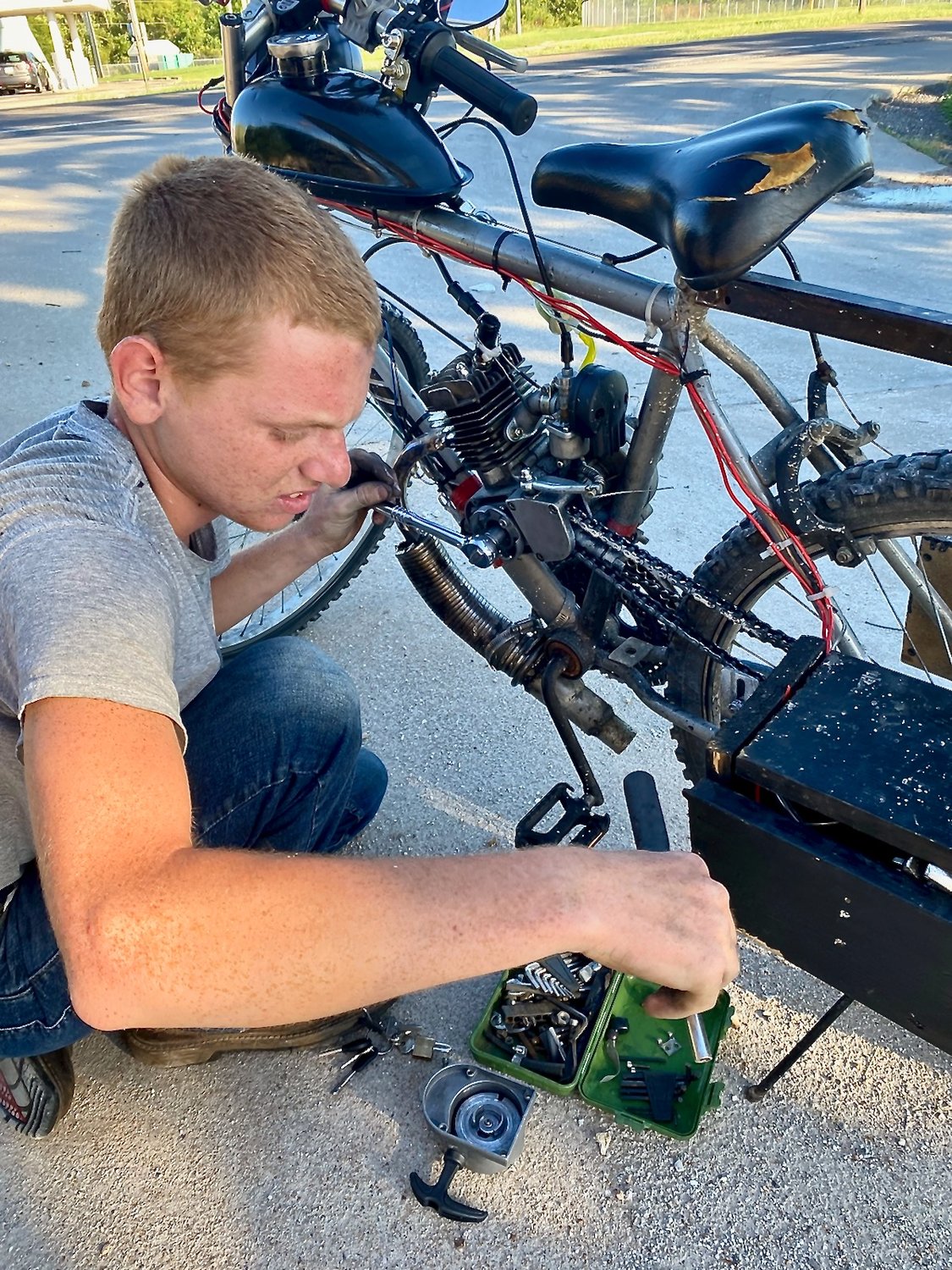 Cody Barton, 16, of Stockton finds a way to travel around town and make his way down fishing paths. Barton has built a motorized kit bike. Barton admits it breaks down occasionally, but he carries tools to work on it. His bike, and the noise it makes, has been a topic of conversation at a couple of city council meetings with the aldermen agreeing that an innovative young person like Cody should be encouraged to continue to build and create. (See Mayor Brandon Cahill’s related statement.)