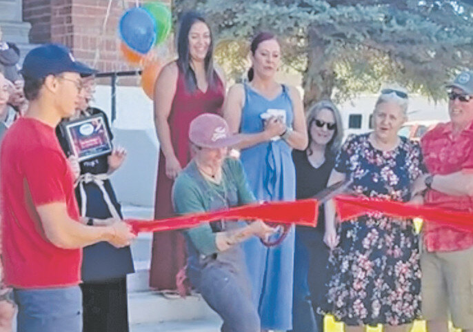 Photo by Marie Mccolm
Church Project owner Madelein Ahlborn cuts the ribbon during a ceremony on July 5 at 256 South Broadway in Monte Vista.