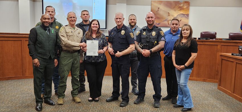 Law enforcement was honored at Wednesday night’s meeting of the city council. Pictured left to right (front row): Alamosa Mayor Ty Coleman, Alamosa County Sheriff Robert Jackson, Councilor Dawn Krebs, APD Chief George Dingfelder, APD Sgt. Tate Kindschuch, Councilor Jackie Vigil. (Back row): ASO Lieutenant William Squires, Councilor Michael Carson, Councilor Jan Vigil and Councilor Jamie Dominguez.  