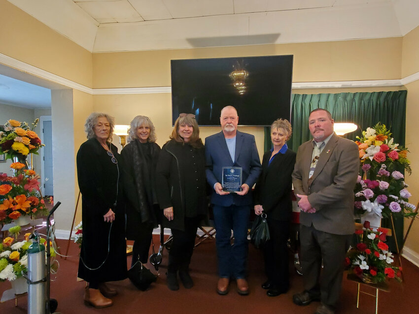 Courtesy photo
At the memorial service for Sgt. C.G. Betenbough, Conejos County Veterans Service Officer Robert Lockwood presented his family with a memorial plaque. From left to right are, Vickie Winsauer, Karen Lofton, Trudy Silverman, Glen Betenbough, Jo Jordan, and Robert Lockwood.