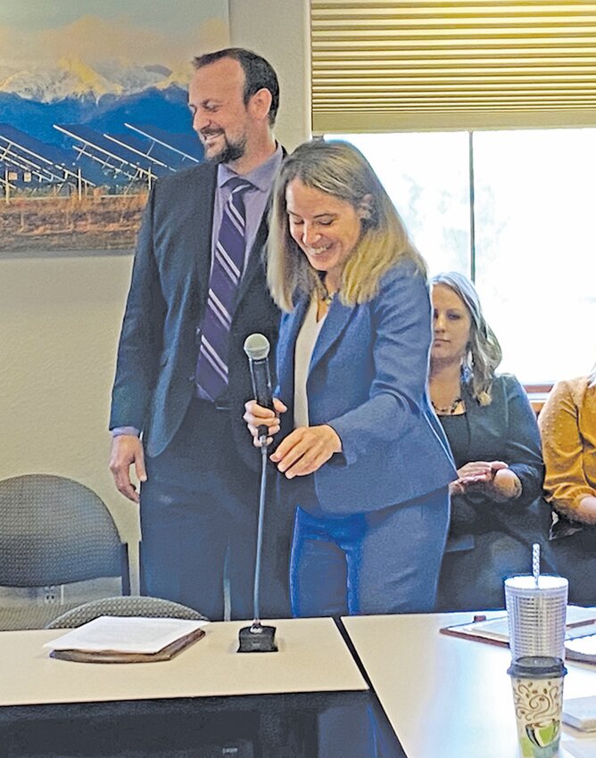 Courier photo by John Waters
Assistant District Attorney Wesley Stafford (left) is introduced by District Attorney Anne Kelly to the members of the San Luis Valley County Commissioners Association meeting on July 23.