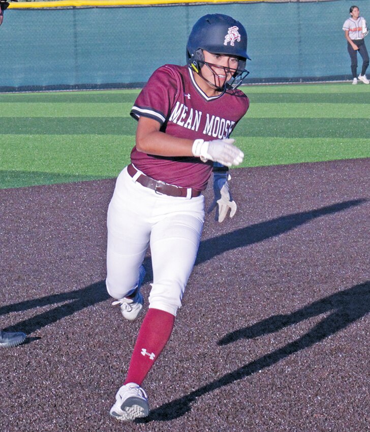 Alamosa High School’s Araceli Molina rounds third and head to home for a three-run inside-the-park home run in the second game of a doubleheader against Montezuma-Cortez Tuesday at the Adams State University softball field. Molina hit a home run in both games as the Lady Mean Moose split with the Lady Panthers losing the first game 11-5 and winning the second 14-4.