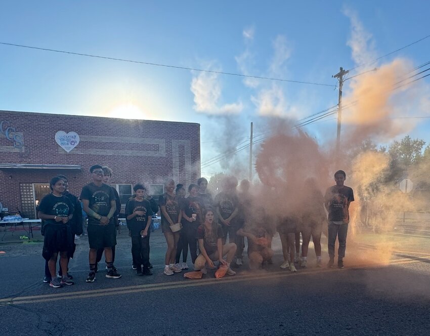 Participants of the suicide awareness color run pose for a photo on Sept. 13 at the Center Viking Youth Club. 