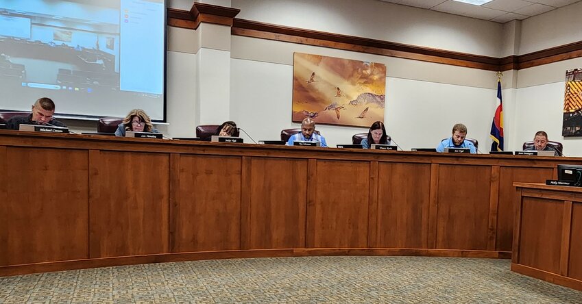 Members of Alamosa City Council follow along as City Manager Heather Sanchez details the city budget for 2025. Pictured left to right: Councilor Carson, Councilor Liz Hensley, Councilor Jackie Vigil, Mayor Ty Coleman, Councilor Jan Vigil and Councilor Jamie Dominguez. 