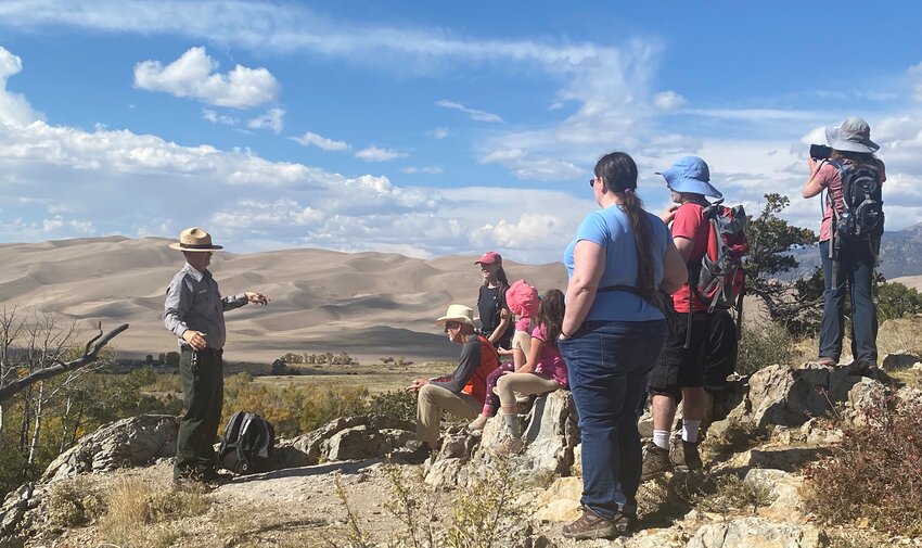 Park Ranger Patrick Myers (left) in Great Sand Dunes National Park and Preserve on Oct. 9.  