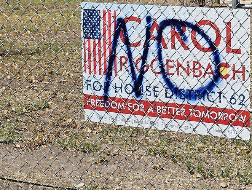 Photo of Harris-Walz sign vandalized along Highway 160.