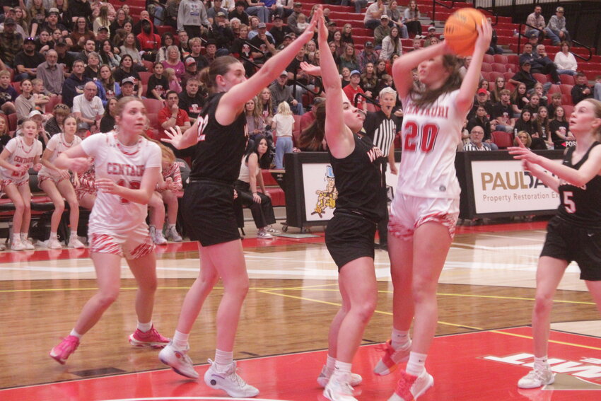 Centauri High School's Joselyn McCarroll (20) looks for an open teammate in Thursday's Class 3A State Tournament quarterfinal game at the University of Denver's Hamilton Gym. McCarroll scored 10 points, but the Lady Falcons lost to Wiggins 32-30.