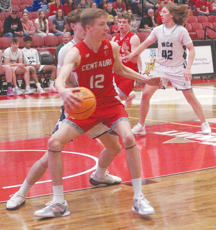 Centauri High School’s Carson Bagwell (12) dribbles the ball in Saturday’s Class 3A State Tournament game against Windsor Charter Academy at the University of Denver’s Hamilton Gymnasium. The Falcons lost to the Firebirds 71-54 to finish in fourth place.