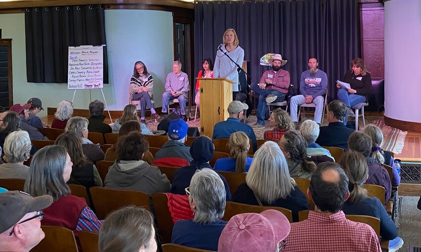 At a town hall held at Society Hall in Alamosa on Saturday to discuss the Trump Administration, panelists (left to right) are Cathy O'Neill, Dr. Kris Steinberg, Angelica Raya Trejo, and Jane Brolsma (organizer), Kyler Brown, Eric Francis, and Paula Medina (moderator). Panelist Chris Canaly is not pictured.  