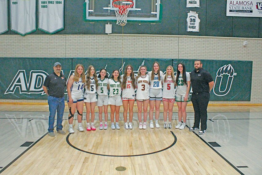 From left, coach Gilbert Sanchez (Del Norte), Presley Wilson (Center), Jaylyn Quezada (Sierra Grande), Sasha Dupont (Monte Vista), Angeleigha Mora (Monte Vista), Reese Brown (Del Norte), Morgan Ortega (Alamosa), Haylee Freel (Sangre de Cristo), Braelyn Tucker (Centauri), Shasta Bond (Sanford), and coach Tomas Meastas (Sierra Grande).