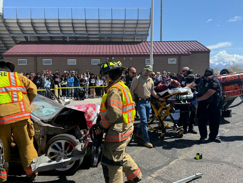 First responders involved in the Alamosa High School mock crash event (left to right): Fireman Josh Cline (AFD), Fireman Christian Wolfe (AFD), Lt. William Squires (ACSO), Sgt. Ryan Veneman (APD), Sgt. Tate Kindschuh (APD), Alamosa EMS Nelson Vialpando, and Officer Justin Salazar (APD).  