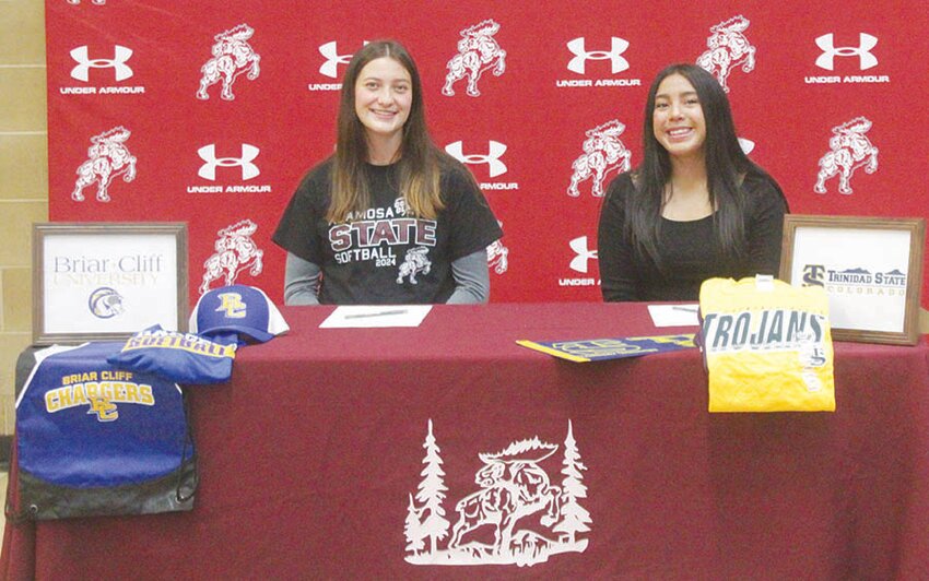 Two Alamosa High School senior student-athletes decided where they will continue their academic and athletic careers on Wednesday. From left, Shea Jordan signed to play softball at Briar Cliff (Iowa) University, and Noemi Lemus singed to play women’s soccer at Trinidad State College.