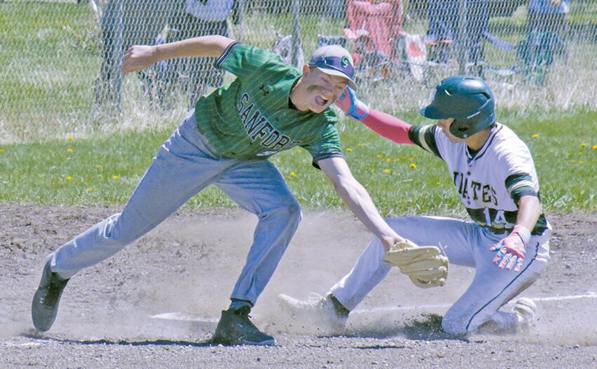 Monte Vista High School’s Jakoby Ross (right) slides into third base before Sanford’s Tyson Miller can make the tag in the first game of a doubleheader Saturday in Sanford. The Pirates swept the Mustangs by scores of 15-0 and 15-6 to win the Southern Peaks League championship.