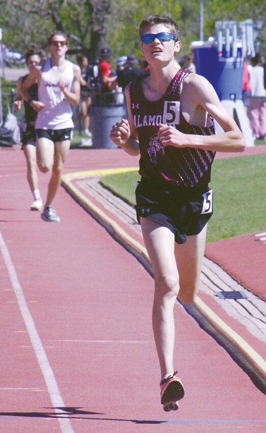 Alamosa High School’s Ethan Merrick approaches the finish line to win the Class 3A boys 3,200-meter run in 9:41.31 at the state track and field championships Friday at Jefferson County Stadium in Lakewood.