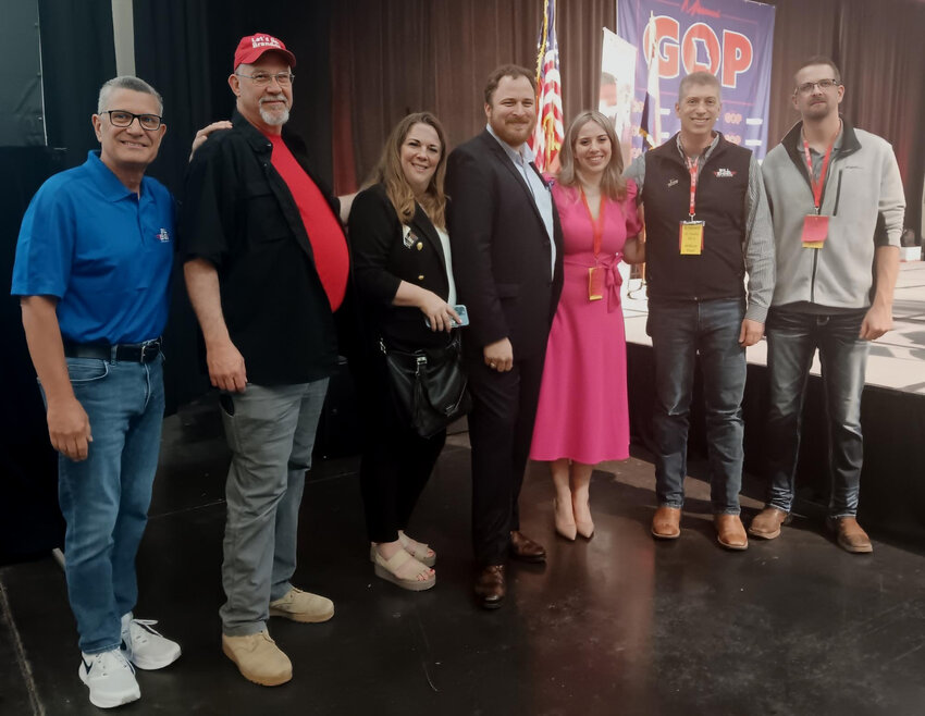 Camden County Delegate Sophie Shore, fifth from left, was elected Republican State Convention Chair Saturday, May 4, in Springfield. Pictured with Sophie are former Missouri Senator Jim Lembke, from left, Camden County Presiding Commissioner Ike Skelton (serving as convention Sergeant at Arms), Stacy Shore, Seth York, Sophie Shore, Sen. Bill Eigel (R-District 23) (Missouri gubernatorial candidate), and Camden County District 4 Delegate Matt Burns (convention Sergeant at Arms). Janet Dabbs/Lake Sun