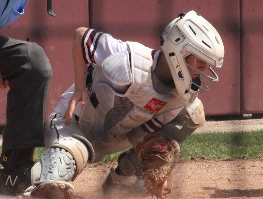 Osage freshman catcher Chance Ottens looks in a pitch during the 6-1 win over Buffalo in the opening round of the Class 4, District 9 baseball tournament on Friday, May 10, at McMillan Field.