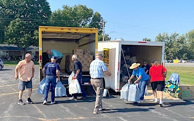 Paper loaders
Several helpers load paper products in a truck for Hope House during the seventh regional Festival of Sharing in Tipton Saturday, Oct. 12. The United Methodist Church was once again the host site for the festival that serves human service agencies across a wide area of Central Missouri.