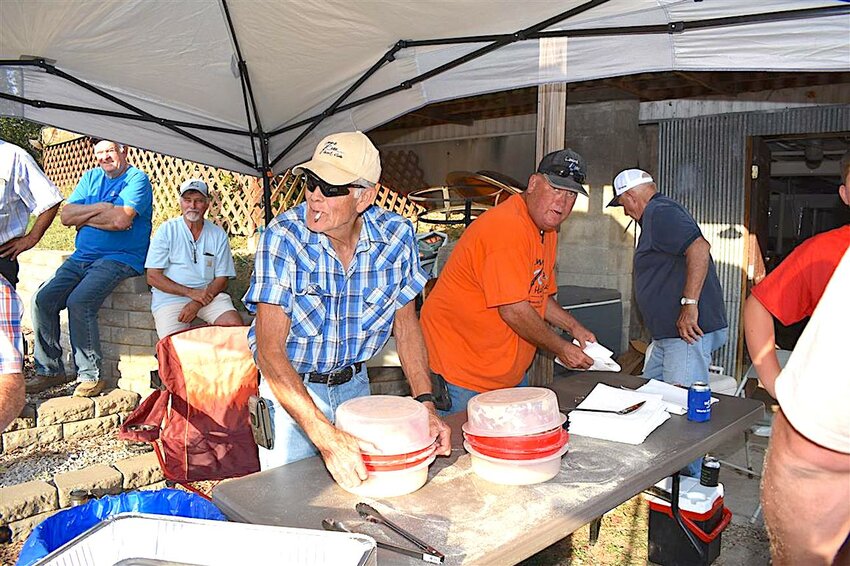 Fish prep
Frank Meyer and a host of volunteers stayed busy dusting fish with coating and cooking it in deep fryers at the Lamine River Hunt Club Saturday, Oct. 12. The fry was one part of the benefit for Russell Stuedle who is recovering from a fall in April.