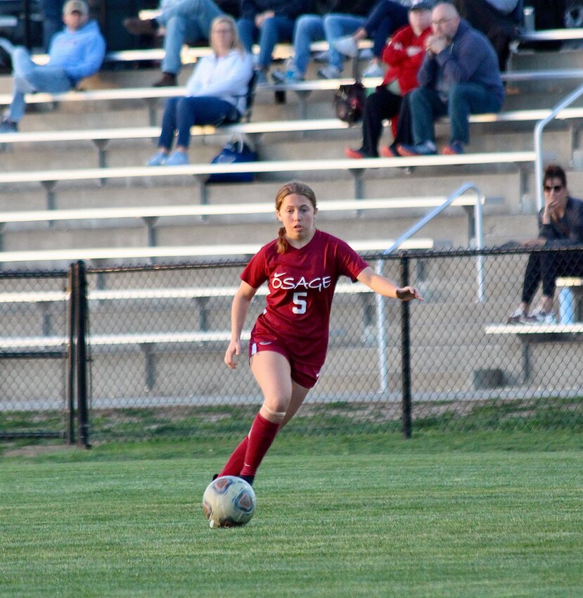 Sophomore forward Isabelle Milligan (No. 5) scored a hat trick (3 goals) along with senior striker Grace Larson to help guide Osage to a 8-0 shutout over Battle on Tuesday, April 16, at the OMS Soccer Field.