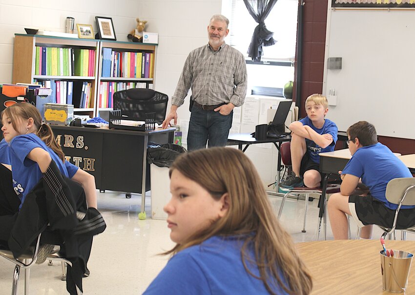 Receiving a legislative plaque-State representative Willard Haley presented Eldon resident Tom Spriggs with a legislative plaque recognizing his accomplishments at the 20th annual Democracy Day, Friday, March 14 at the Eldon Upper Elementary.