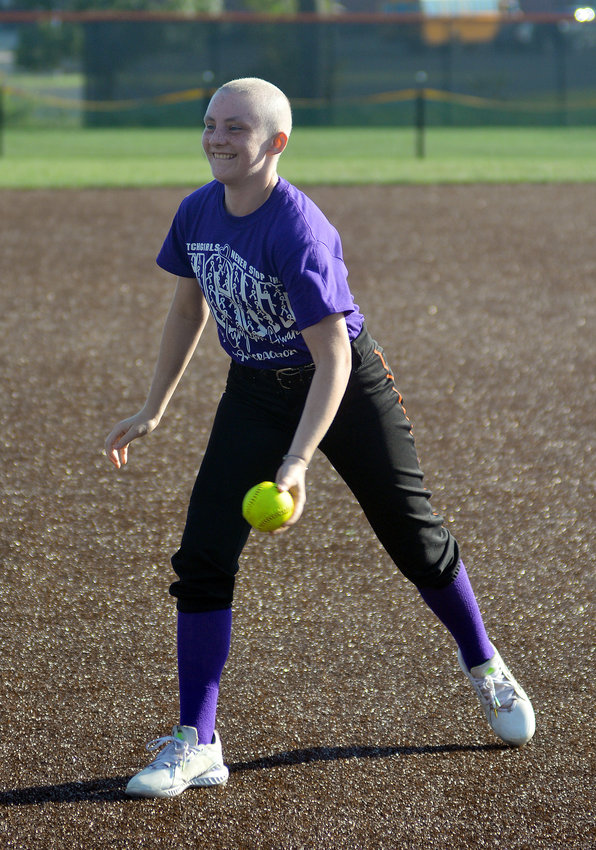 Donning purple t-shirts in honor of Dutchgirl sophomore Grace Abell (above), Hannah Koppelmann&rsquo;s Owensville Dutchgirl softball team took on Cuba&rsquo;s Lady Wildcats back on Monday, Oct. 4 at OHS Field in the inaugural purple out game raising awareness for Hodgkin&rsquo;s Lymphoma which Abell has since beaten.