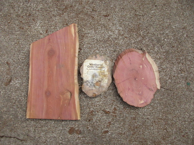 With no kiln drying, this cedar came from logs that have been dead for  more than 70 years.  The center plaque is a sample of the ones Walnut Hollow Farms got from us in the 70&rsquo;s. They sold a huge number of these.