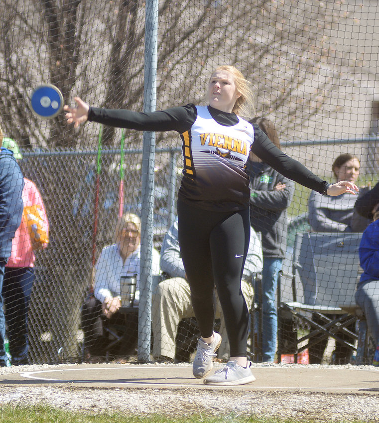 Ava Kloeppel lets one of her four attempts fly in the girls discus during Friday&rsquo;s rescheduled track meet at Linn High School.