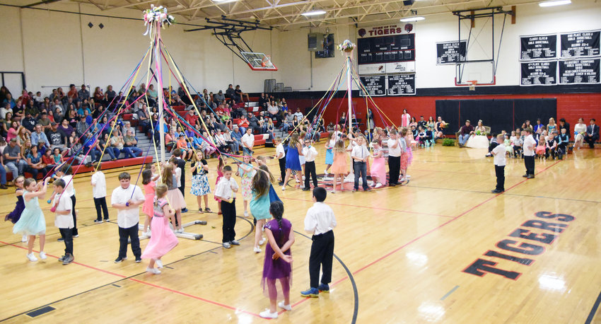 BELLE FOURTH grade students performed the winding of the May Pole during the 56th annual May Day festival on Friday, May 5, 2017.