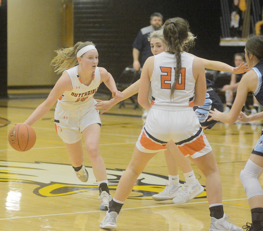 Anna Finley (far left) handles the basketball for Ryan Flanagan&rsquo;s Owensville Dutchgirls during the semifinals of the Missouri State High School Activities Association (MSHSAA) Class 4, District 3 Girls Basketball Tournament at Sullivan High School back in early March.