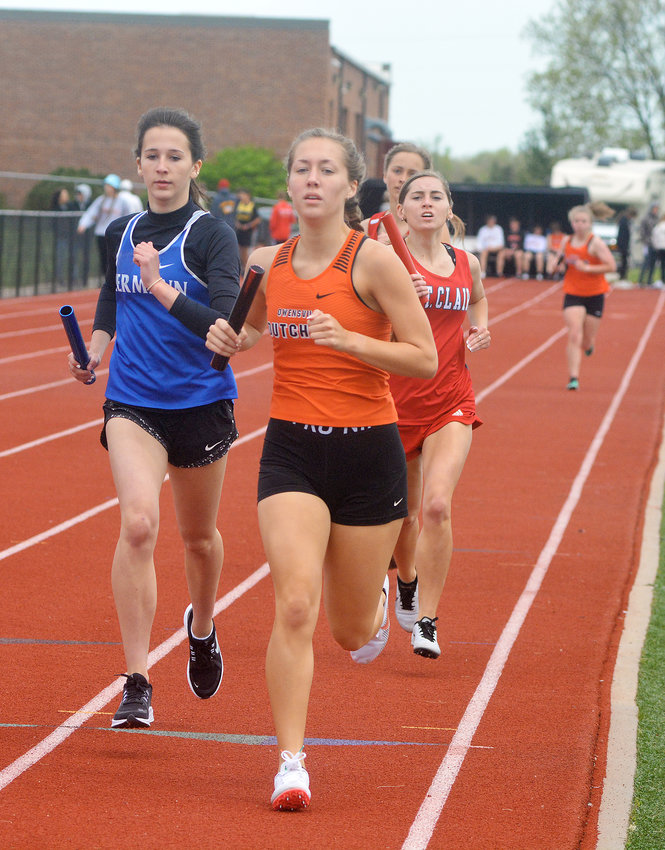 Kyah Weirich (center) is shown competing in the annual Four Rivers Conference (FRC) track meet this past spring hosted by Owensville High School at Dutchmen Field during the varsity girls 4x800-meter relay. Weirich&rsquo;s senior season ended during the Missouri State High School Activities Association (MSHSAA) Class 3 Sectional 3 Track Meet at Hollister High School following a fifth-place finish in the same event.