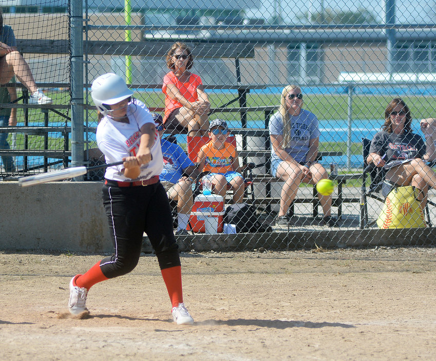 Dakota Butcher swings at a pitch for Belle Lady Tiger softball at the Montgomery County Fall Softball Classic Saturday along Highway 19. Butcher scored two runs as part of Belle&rsquo;s 15-0 victory over St. Clair&rsquo;s Lady Bulldogs in their tournament opener.