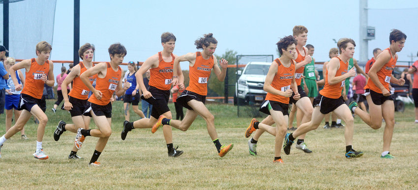 Owensville&rsquo;s JV Dutchmen harriers warm up prior to their race last Tuesday afternoon at the Owensville Cross Country Invitational on the Gasconade County R-2 Campus by running out of the starting boxes.