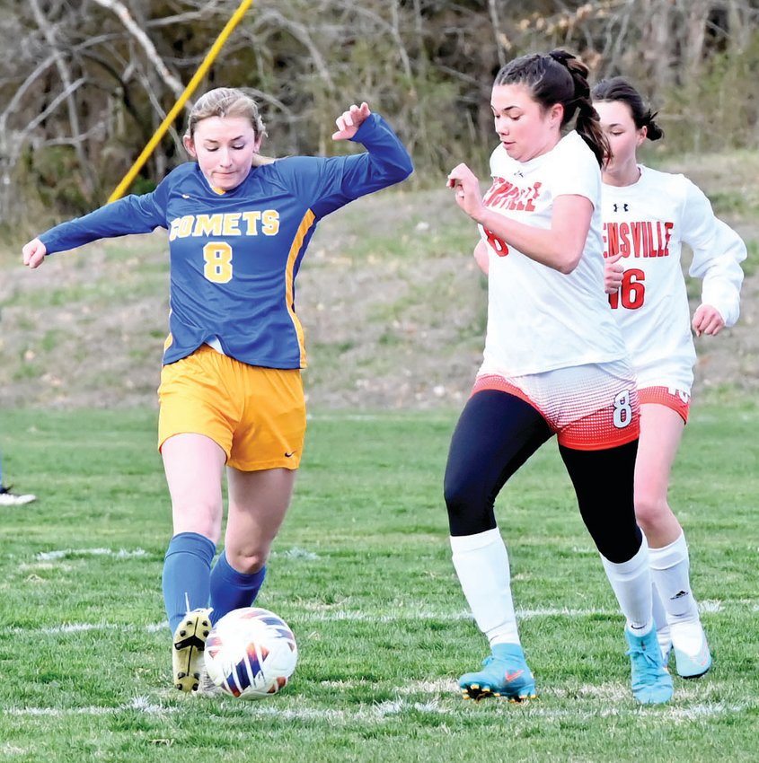 Hannah Heisler moves to push the ball ahead of an Owensville player in Friday&rsquo;s opener at Westphalia.