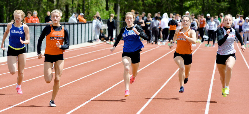 Gasconade County was well represented during the finals of the varsity girls 100-meter dash Monday at the annual Four Rivers Conference (FRC) track meet in New Haven. Sprinting down the track (from left) were Hermann&rsquo;s Ashlyn Hughes, Owensville&rsquo;s Emma Daniels, Alaina Worland and Emma Daniels.